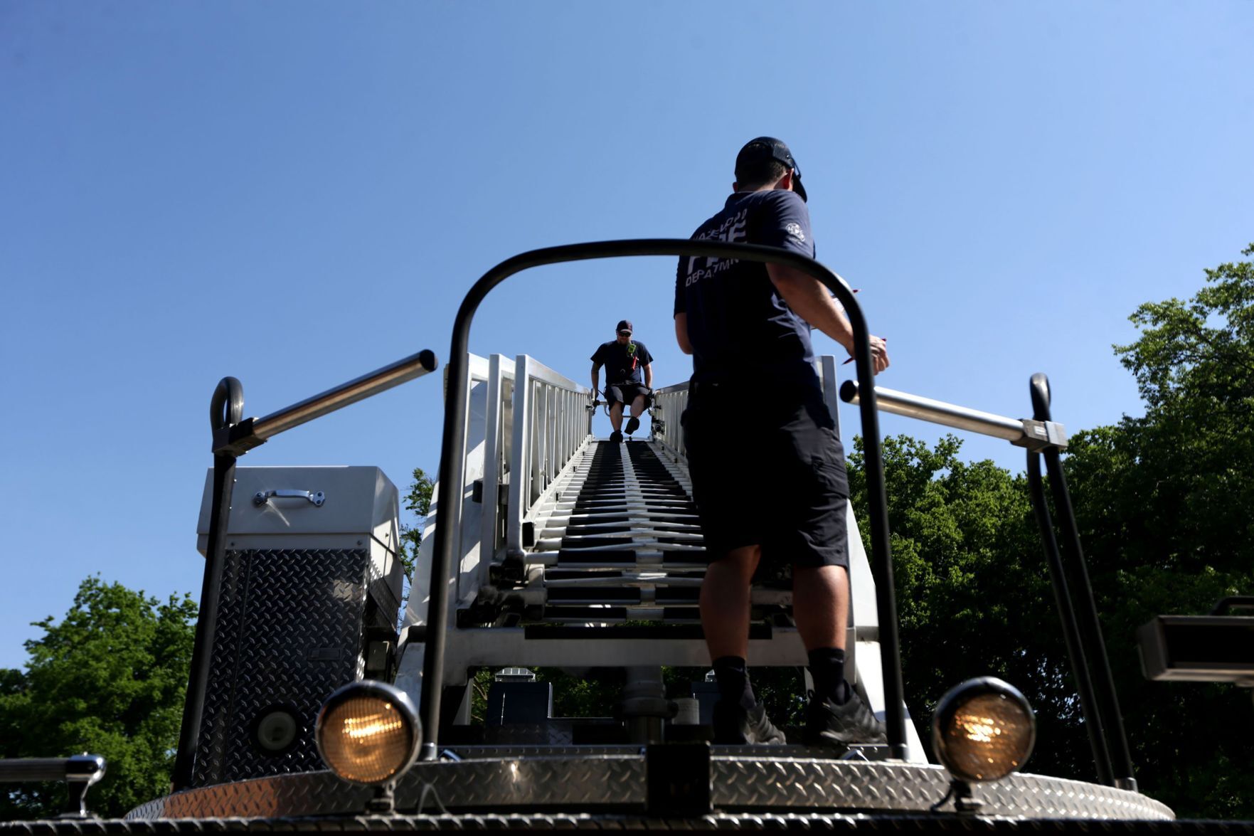 Hazelwood firefighters inspect hook and ladder truck
